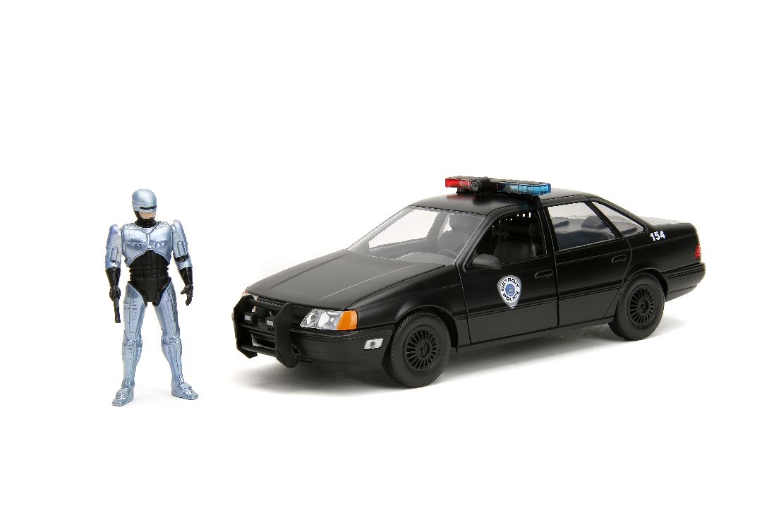 Jada 1/24 "Hollywood Rides" 1986 OCP Ford Taurus w/ RoboCop – image 3