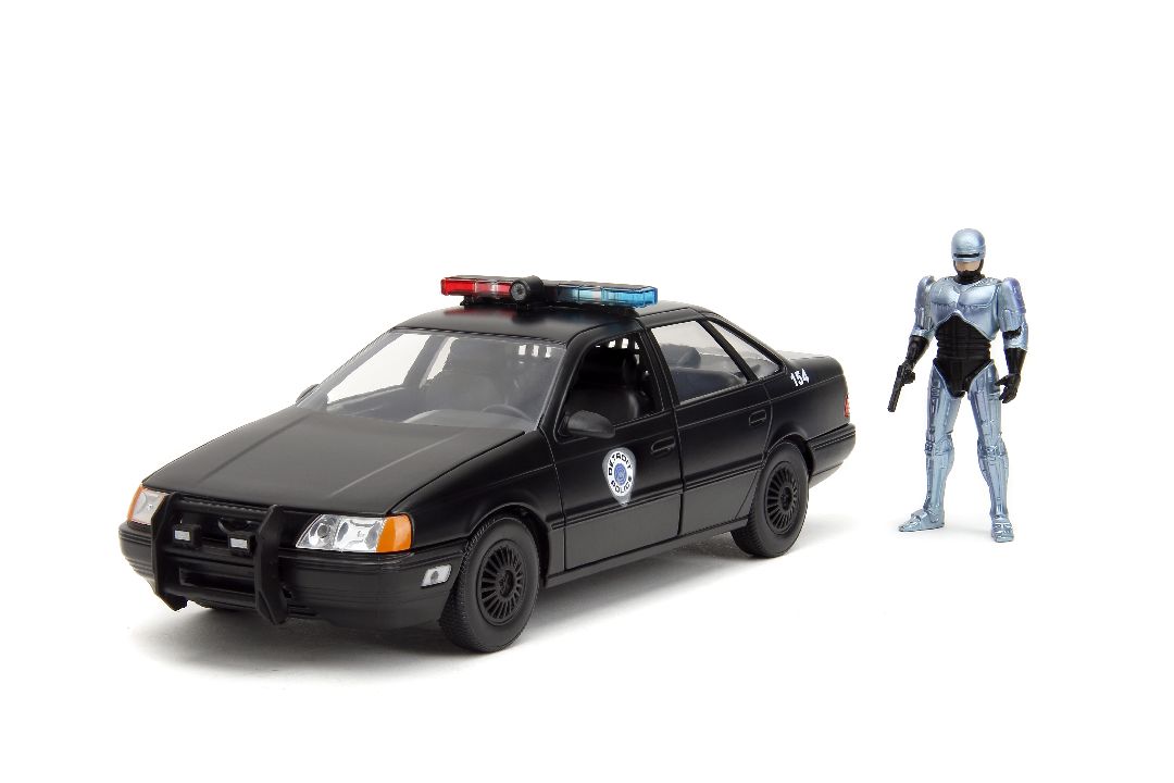 Jada 1/24 "Hollywood Rides" 1986 OCP Ford Taurus w/ RoboCop – image 2