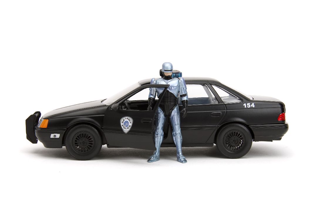 Jada 1/24 "Hollywood Rides" 1986 OCP Ford Taurus w/ RoboCop – image 4