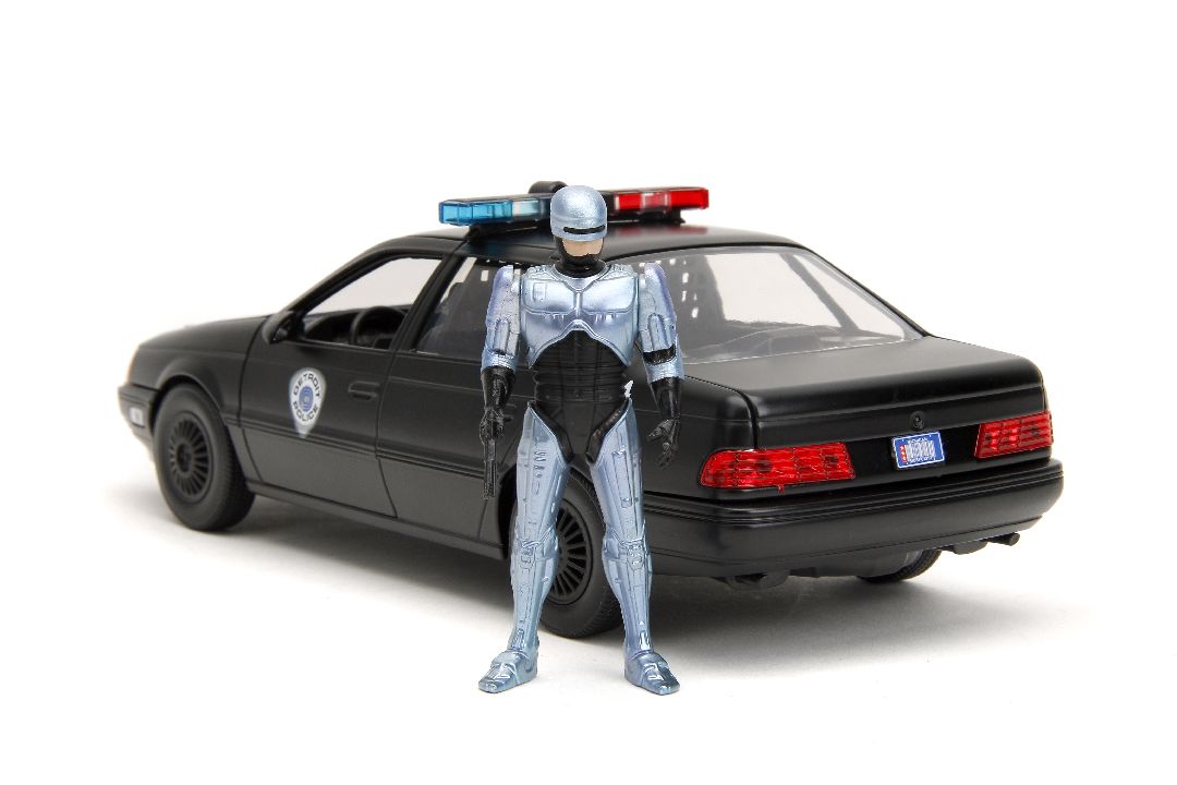 Jada 1/24 "Hollywood Rides" 1986 OCP Ford Taurus w/ RoboCop – image 8