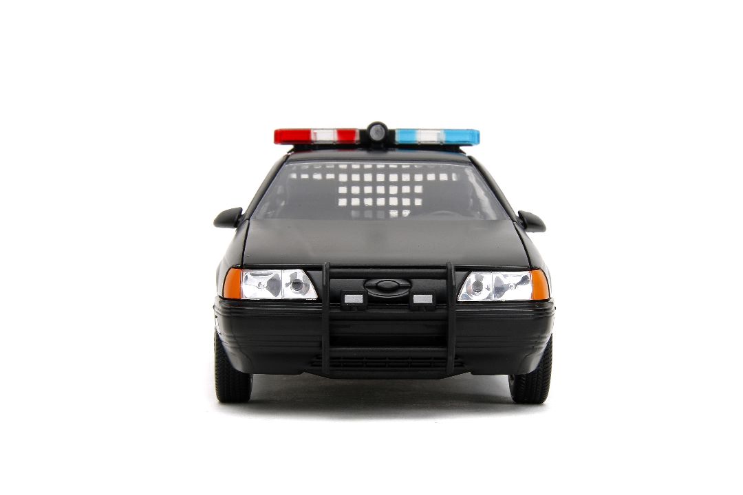 Jada 1/24 "Hollywood Rides" 1986 OCP Ford Taurus w/ RoboCop – image 6