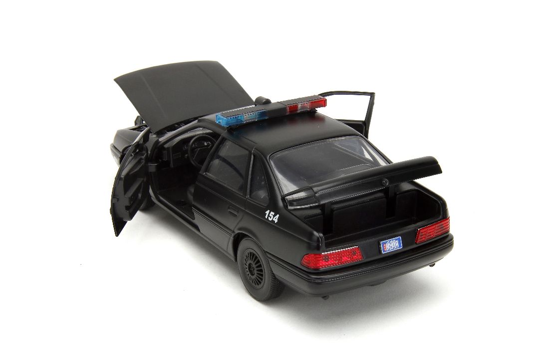 Jada 1/24 "Hollywood Rides" 1986 OCP Ford Taurus w/ RoboCop – image 17